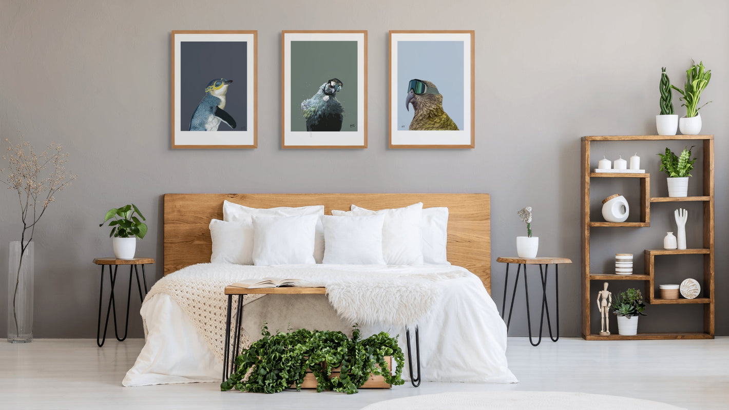 Modern bedroom with wooden bed, white bedding, and decorative elements.